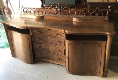 Lot 191 - Large 19th century style mahogany serpentine fronted sideboard with four central graduated drawers flanked by cupboards, 226cm wide, 73cm deep, 89cm high