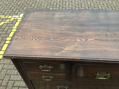 Lot 212 - Edwardian oak chest with central hat drawer flanked by four short drawers and three long graduated drawers below, 122cm wide, 53cm deep, 121cm high