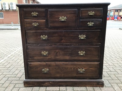 Lot 212 - Edwardian oak chest with central hat drawer flanked by four short drawers and three long graduated drawers below, 122cm wide, 53cm deep, 121cm high