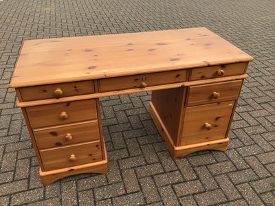 Lot 218 - Pine kneehole desk table with nine drawers, 136cm wide, 63cm deep, 77cm high