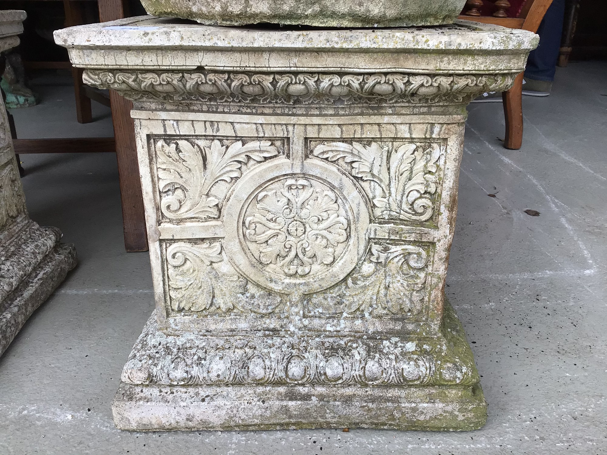 Lot 236 - Pair of concrete garden urns on square