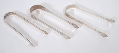 Lot 507 - 3 pairs of George III Bateman silver sugar tongs, with bright cut engraved decoration