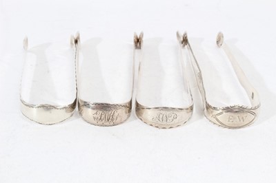 Lot 302 - 4 pairs of George III silver sugar tongs, with bright cut engraved decoration