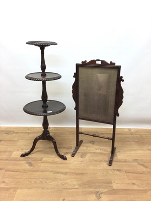 Lot 120 - Good quality mahogany three tier wine table on faceted column and three hipped splayed legs, 104cm high