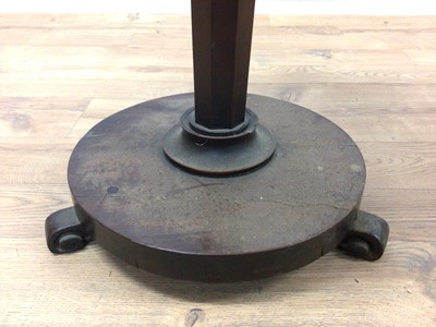 Lot 116 - Nineteenth century mahogany wine table with circular top on faceted column and circular base with scroll feet, 48cm diameter, 69cm high