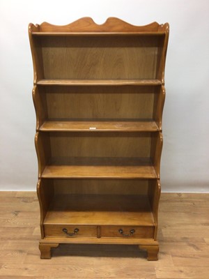 Lot 95 - Pine waterfall bookcase with open shelves and two drawers below, 78cm wide, 38cm deep, 150cm high