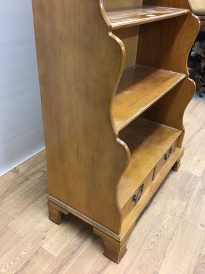 Lot 95 - Pine waterfall bookcase with open shelves and two drawers below, 78cm wide, 38cm deep, 150cm high