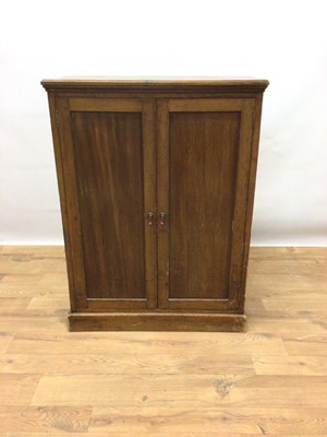 Lot 272 - Edwardian mahogany bookcase with shelved interior enclosed by two panelled doors, 68cm wide, 35cm deep, 91cm high