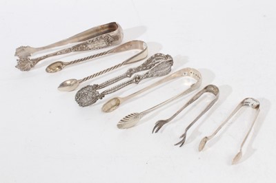 Lot 519 - Pair of Victorian silver sugar tongs with beaded borders, (London 1867), and others