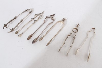 Lot 520 - Pair of Edwardian silver sugar tongs (Sheffield 1904), maker Thomas Bradbury and others