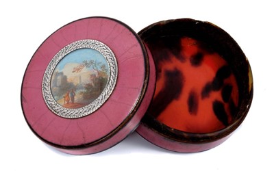 Lot 855 - 18th century French tortoiseshell snuff box of circular form, the top inset with watercolour scene