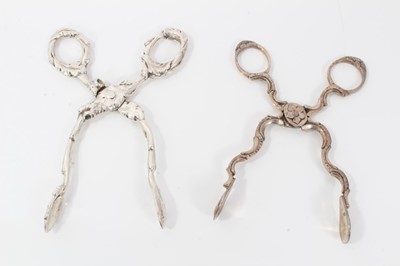 Lot 313 - Pair of George III silver scissor action sugar nips, circa. 1760, 12cm overall, together with a pair of good quality William IV silver scissor action sugar nips, (London 1834) (2)
