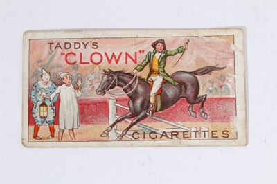 Lot 190 - Cigarette cards - Taddy & Co. Type card, Clowns & Circus Artists - Horse and rider jumping a gate.