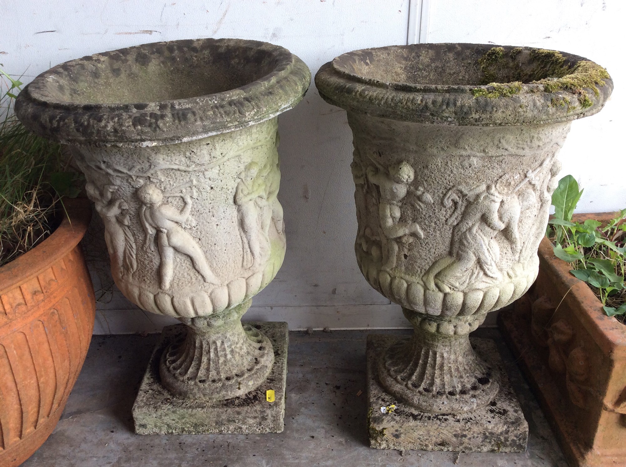 Lot 624 Pair of concrete garden urns and three other