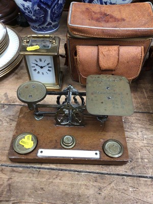Lot 29 - Brass carriage clock, together with, postal scales, camera