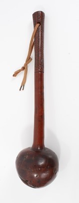 Lot 849 - 19th century Fijian Ula throwing club with bulbous head, and carved zig zag decoration to end of handle, 39cm in length