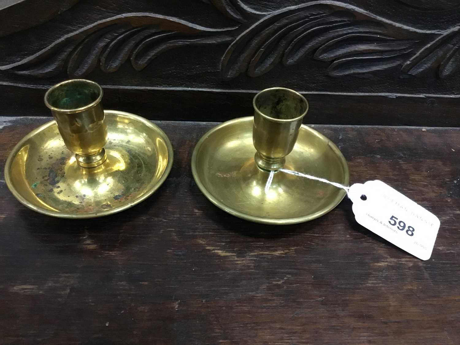 Lot 598 Antique brass Brighton bun candlesticks of