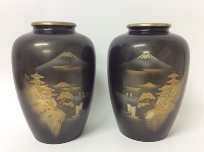 Lot 345 - Pair of Japanese bronze and metal applied vases with landscape decoration.