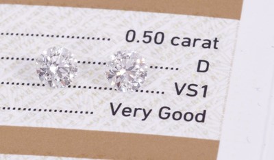 Lot 636 - Pair of unmounted diamonds, each with G.I.A. Certificates 0.50cts, D colour, VS1 clarity