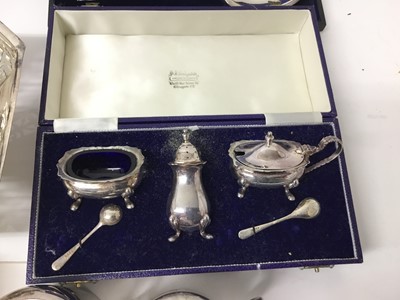 Lot 217 - Group of silver plated wares to include pair of 19th Old Sheffield Plated candlesticks, plated cutlery, plated salvers etc