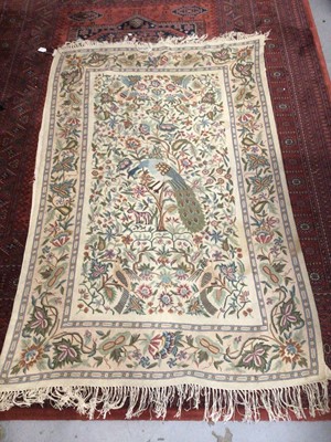 Lot 102 - Hand stitched wool tapestry rug with fringing.