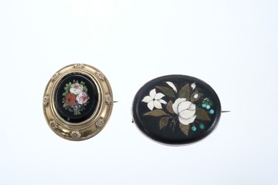 Lot 552 - Two 19th century pietra dura brooches, one with oval panel depicting summer flowers in a gilt metal brooch mount, 35mm x 30mm, the other with white flowers and forget-me-knots, in silver brooch mou...