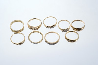 Lot 569 - Group of nine gold and diamond set dress rings