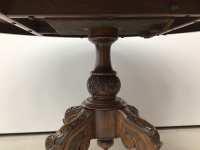 Lot 35 - Victorian inlaid walnut oval loo table
