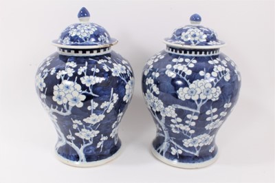 Lot 143 - Pair of Chinese baluster vases and covers, prunus blossom ornament