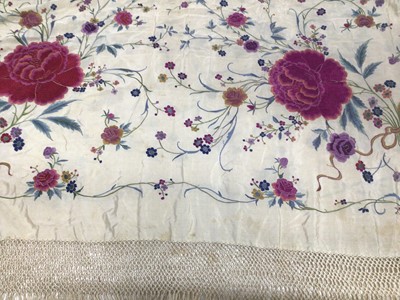 Lot 1934 - Fine quality Chinese silk shawl, embroidered flowers in poly-chrome silk thread, deep knotted fringing.