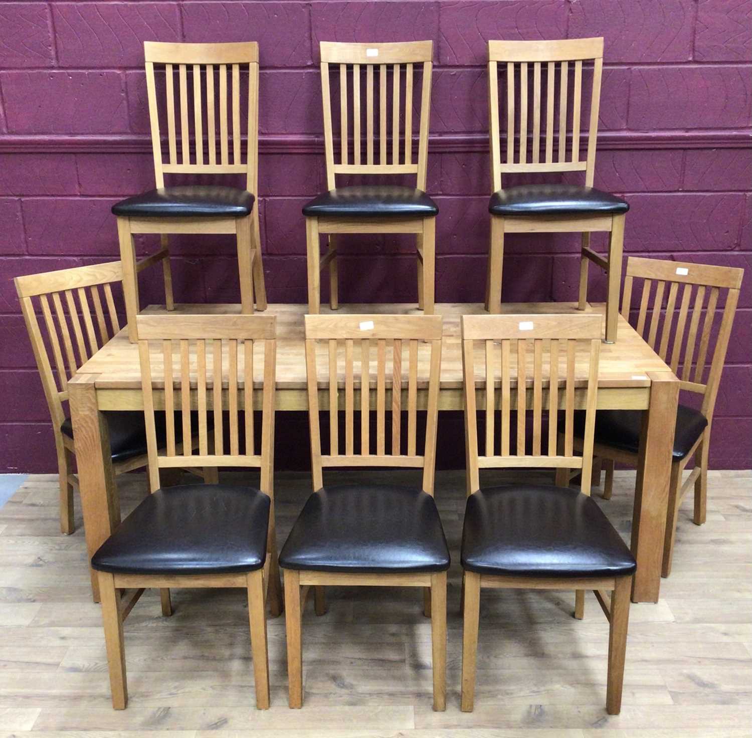 Lot 332 - Good quality light oak dining room table and set of eight chairs