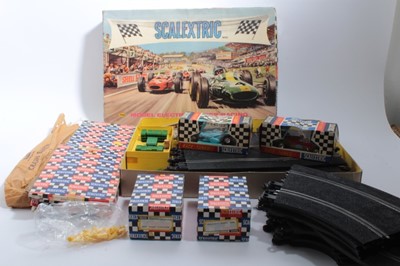 Lot 1629 - Scalextric two boxed racing card C-80, C-79.  Two hand throttles boxed plus track and accessories etc