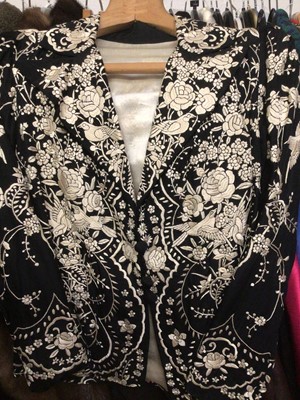 Lot 1900 - Chinese black silk jacket with cream embroidered flowers and birds, cream silk lining, circ.1960's