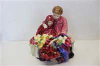 Lot 2078 - Royal Doulton figure group - Flower Seller's...