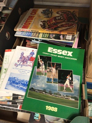Lot 70 - Five boxes of mixed ephemera and books include Giles annuals, Ian Botham signed Essex cricket programme, theatre programmes and other items