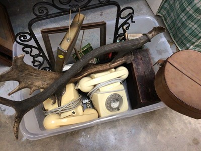 Lot 122 - Two vintage cream plastic telephones, leather collar box, stag antlers and sundries