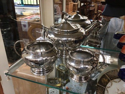 Lot 109 - Edwardian three piece silver plated teaset with engraved foliate decoration