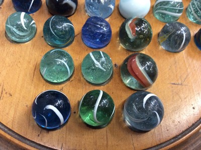 Lot 30 - Vintage solitaire board and two sets of marbles