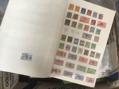 Lot 259 - Seven stamp albums, world stamps and a collection of loose stamps