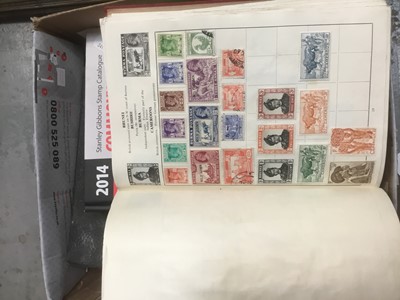 Lot 251 - Eight stamp albums, world stamps, and a collection of loose stamps