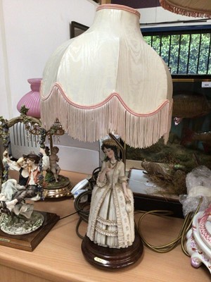 Lot 106 - Two Capodimonte lamps and a further figure
