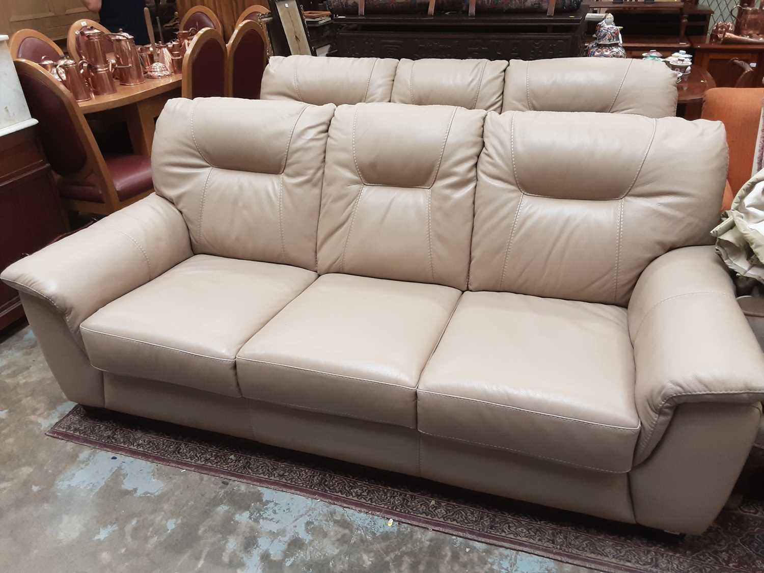 Lot 998 - Two contempory three seater beige leather sofas