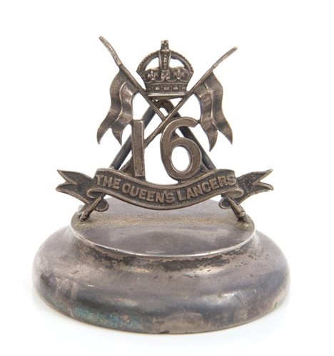 Lot 10 - 1920s sterling silver desk weight with Kings...