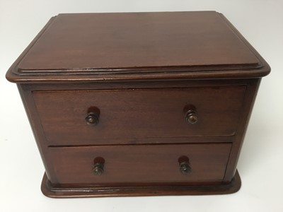 Lot 175 - Small 19th century mahogany table top chest of two drawers