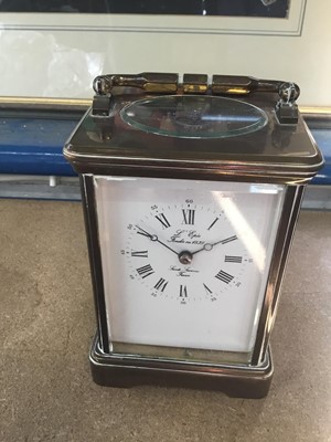 Lot 203 - Brass Carriage clock with white enamel dial