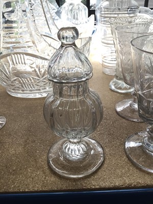 Lot 200 - Collection of cut glass and pressed glass wares to include decanters, cake stands and other pieces