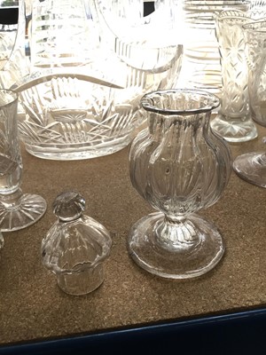 Lot 200 - Collection of cut glass and pressed glass wares to include decanters, cake stands and other pieces