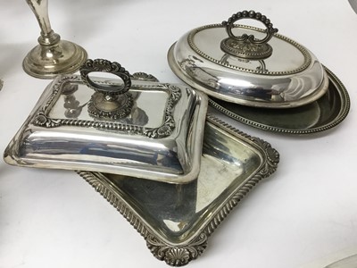 Lot 144 - Victorian silver plated melon shape teapot, two Edwardian silver plated entre dishes and covers, pair of silver plated candelabras and and a set of six silver plated goblets