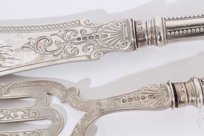 Lot 377 - Pair of Victorian silver fish servers with engraved and pierced silver blades and silver handles