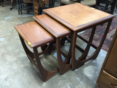 Lot 894 - Teak nest of three tables and oak wine table on spiral twist coloumn